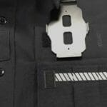 GVS BC-02 Magnetic Mount's metal plate sits behind the fabric and another magnetic metal plate is placed outside the uniform. 