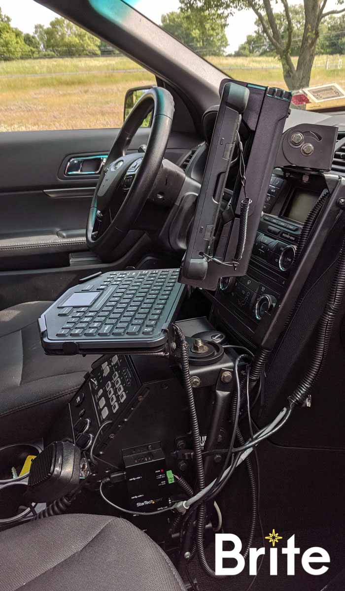 Getac F110 with a Gamber-Johnson Dock in a Ford Utility - Side View