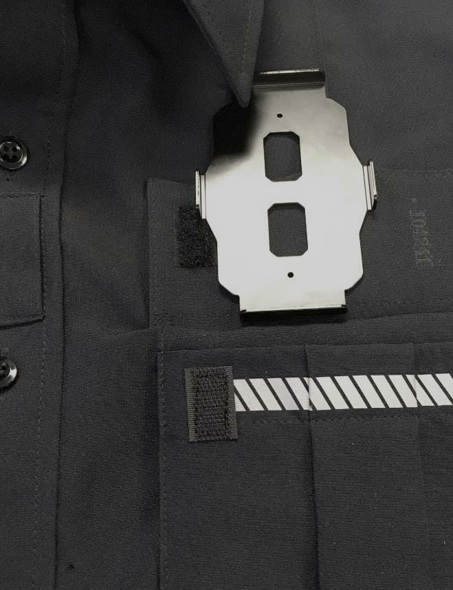 GVS BC-02 Magnetic Mount's metal plate sits behind the fabric and another magnetic metal plate is placed outside the uniform. 