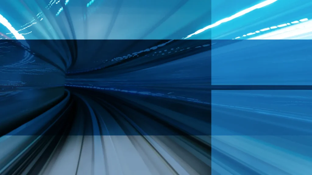 One Step Ahead Blog Featured Image A tunnel with various shades of blue